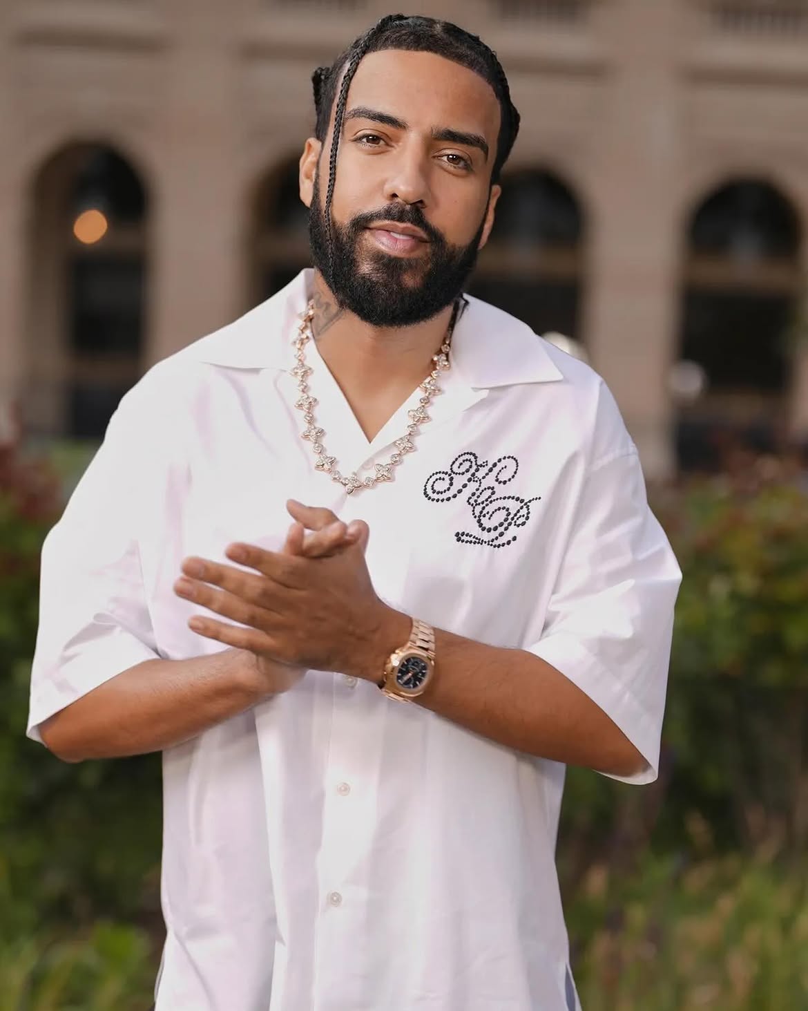 French Montana wearing Kenzo at the Kenzo runway show during Paris Fashion Week